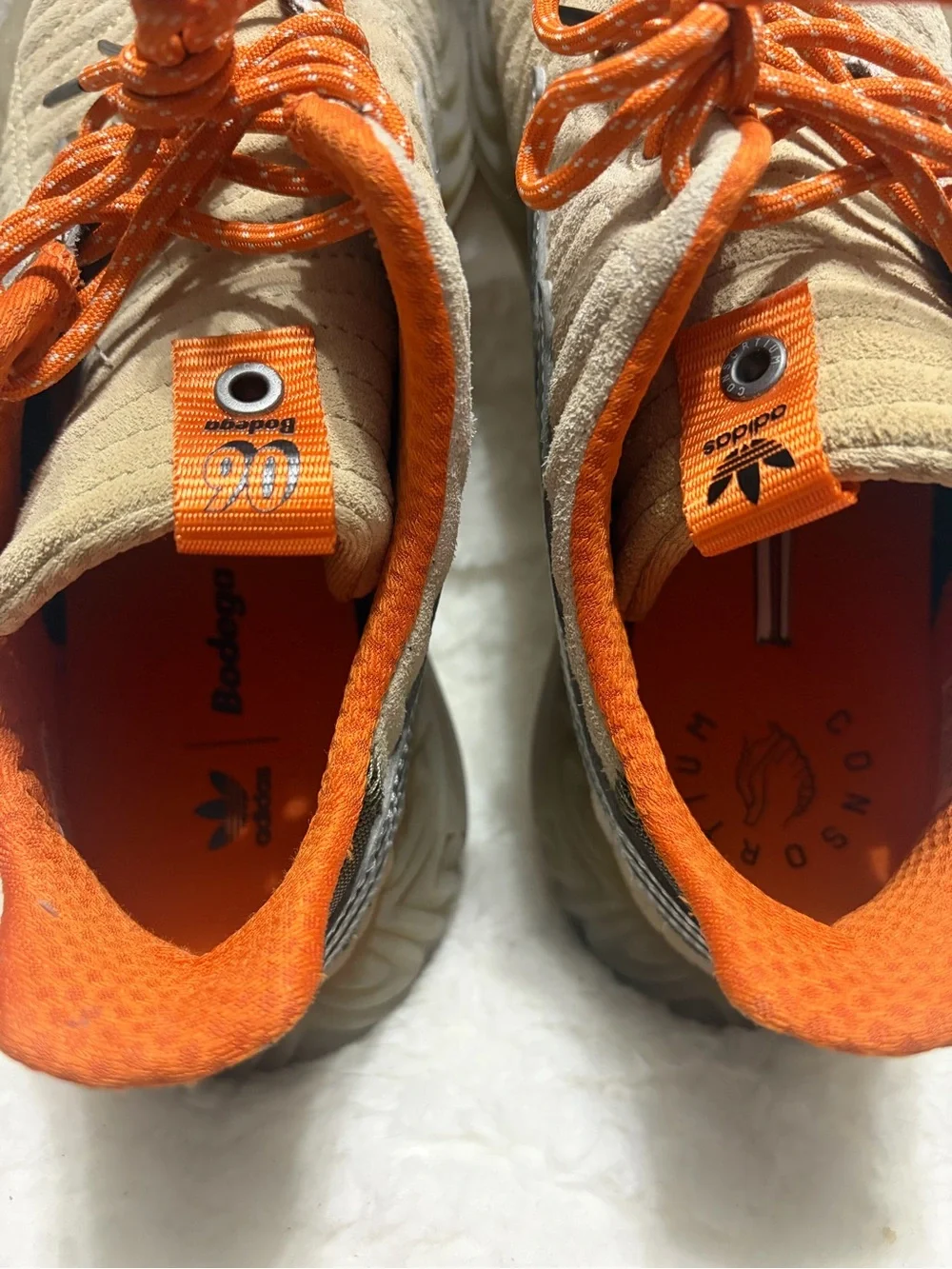 adidas men’s Sobakov Bodega Beige with Orange Accents Sneakers